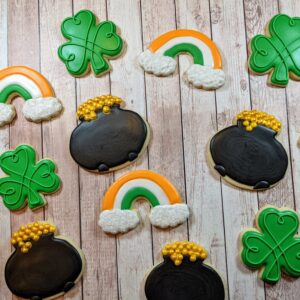 St Patrick's Day Cookies on a wood plank back ground.